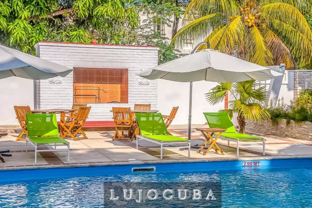 Pool terrace and outdoor seating at Mansion El Duque