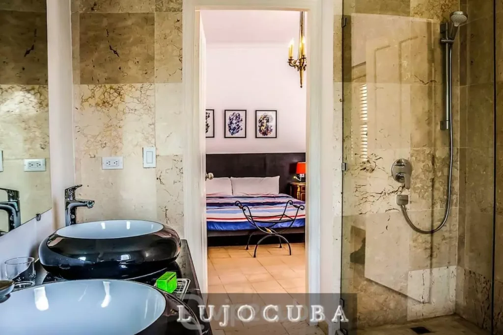 Stone bathroom with shower at Mansion El Duque