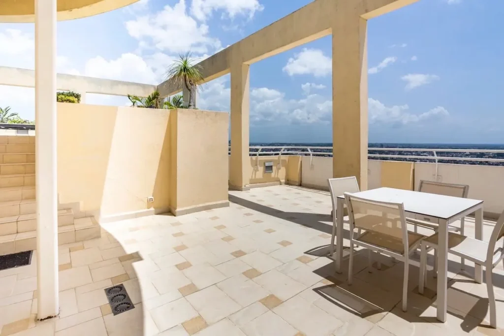 Outdoor dining terrace with elevated views at Penthouse Atlantic City
