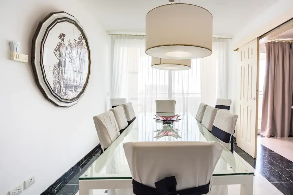 Glass dining table inside Penthouse Atlantic City