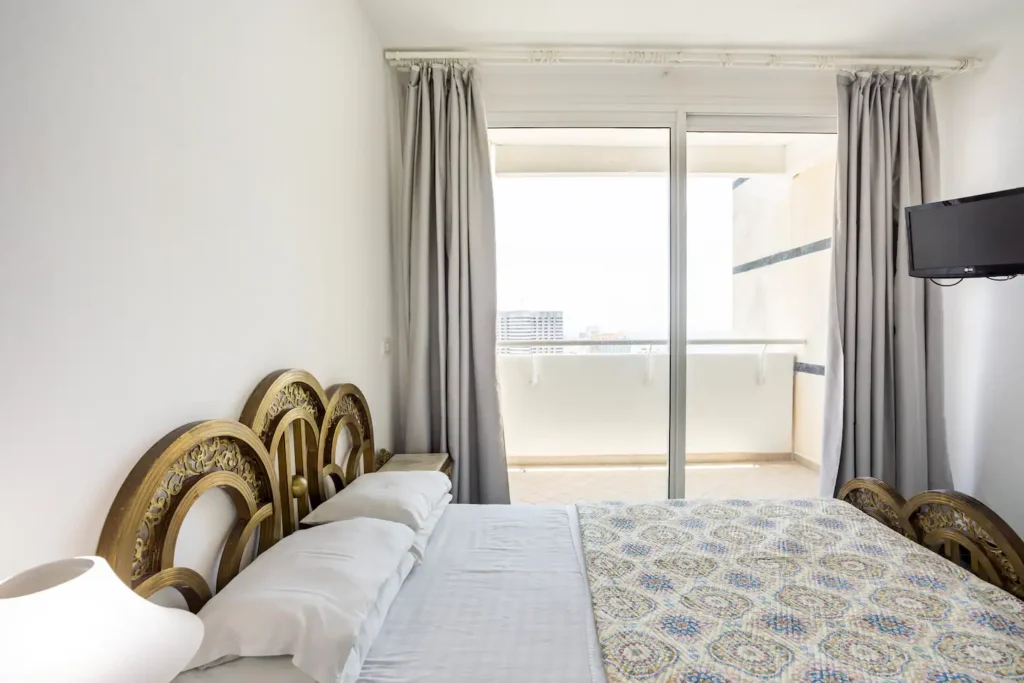 Bedroom with classic headboard at Penthouse Atlantic City