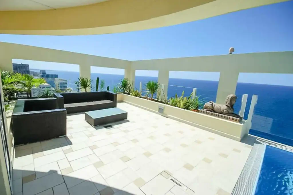 Open terrace with seating and Atlantic views at Penthouse Atlantic Sea