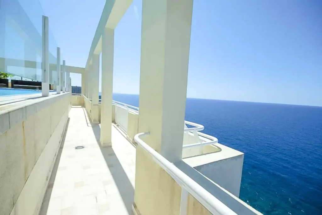 Penthouse balcony looking across the sea in Vedado, Havana