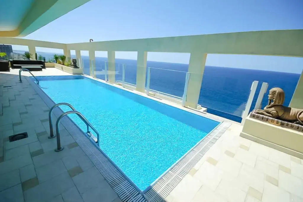 Long private pool and covered sea-facing terrace in Havana