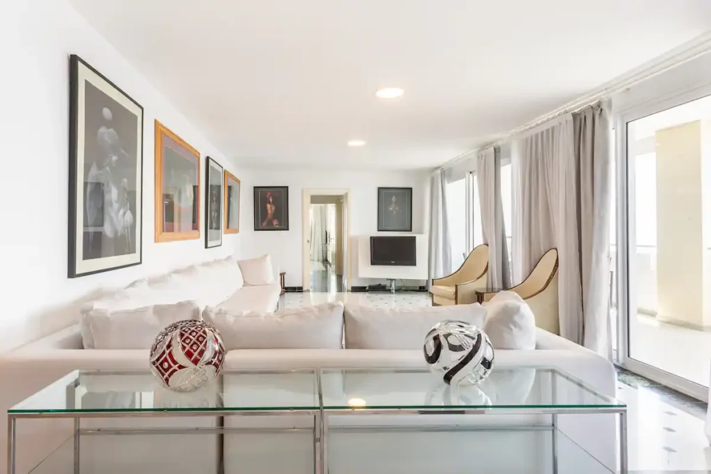 White living area and open landing inside the Havana penthouse