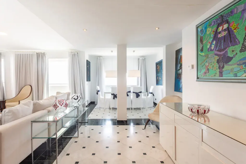 Contemporary lounge and dining space with colourful art
