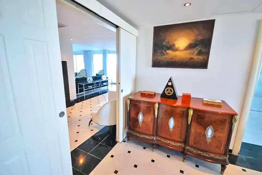 Entrance hall with artwork and polished floors