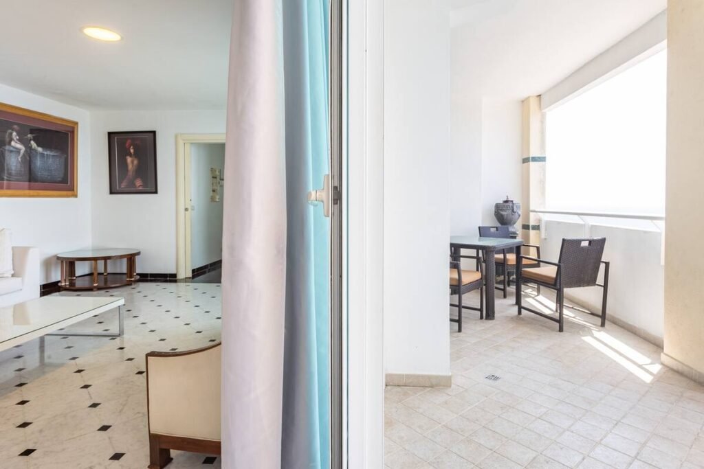 Quiet corner room beside broad penthouse windows