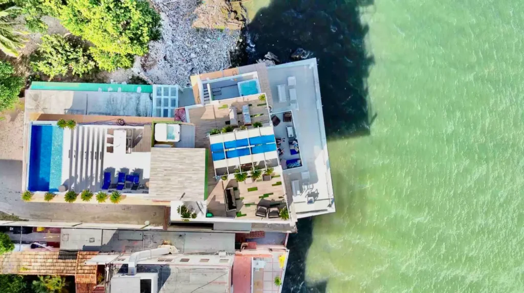 Aerial view of Penthouse Rio Mar beside the water in Havana
