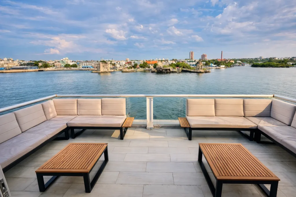 Open-air lounge with panoramic water views at Penthouse Rio Mar