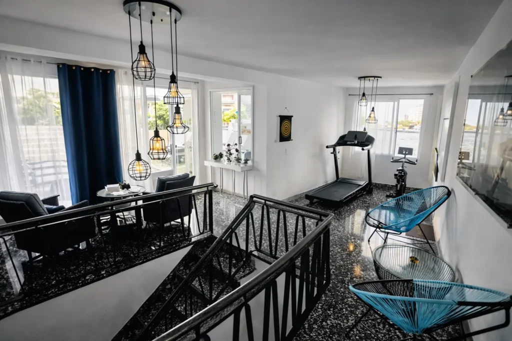 Bright interior hall and staircase inside Penthouse Rio Mar