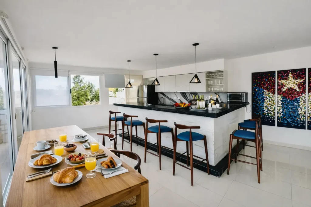 Kitchen counter and breakfast setting at Penthouse Rio Mar
