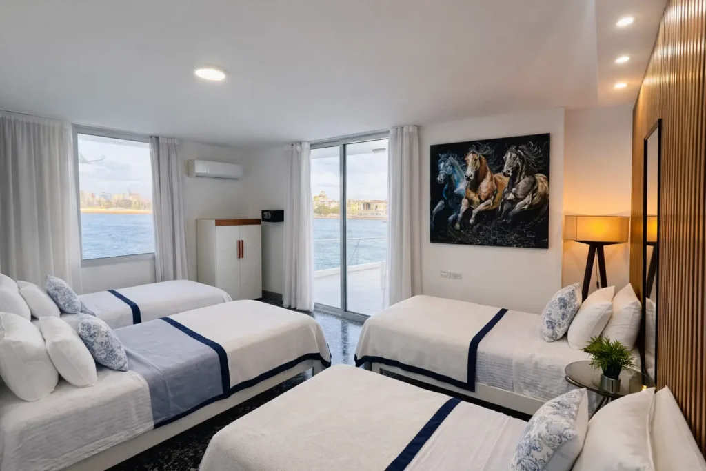 Spacious multi-bed room overlooking the water at Penthouse Rio Mar