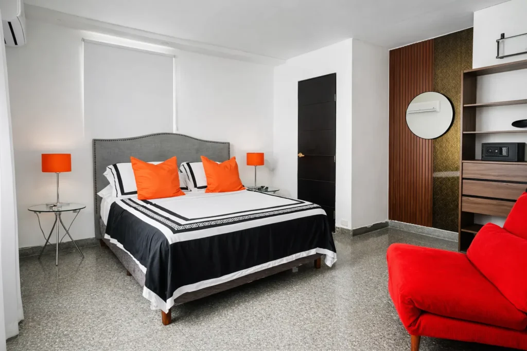 Black and white king bedroom inside Penthouse Rio Mar