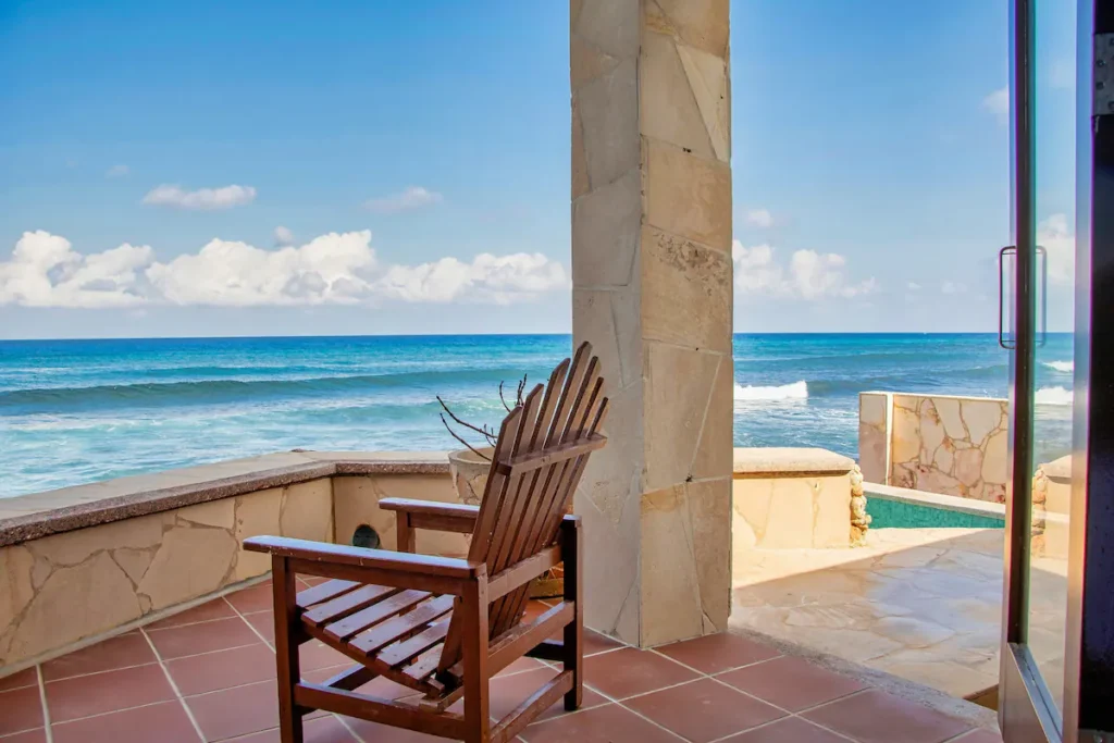 Sheltered terrace looking directly across the water