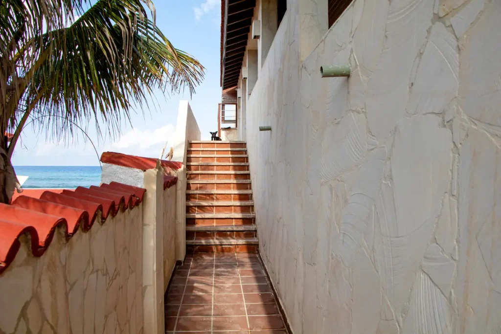 Outdoor stairs connecting the loft levels and terraces