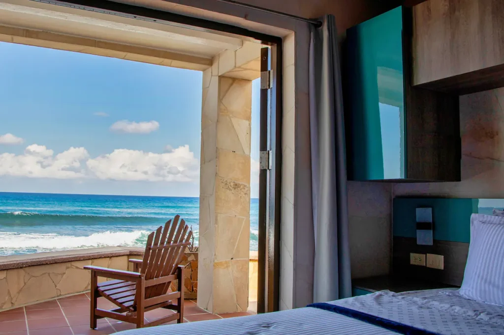 Sea view from a bright bedroom within The Loft