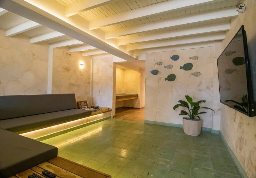Bedroom beside the sheltered pool at The Loft