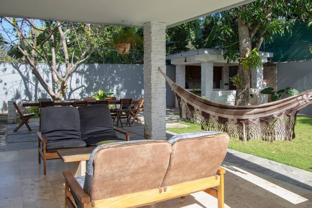 Hammock and outdoor seating in Villa Aurora garden