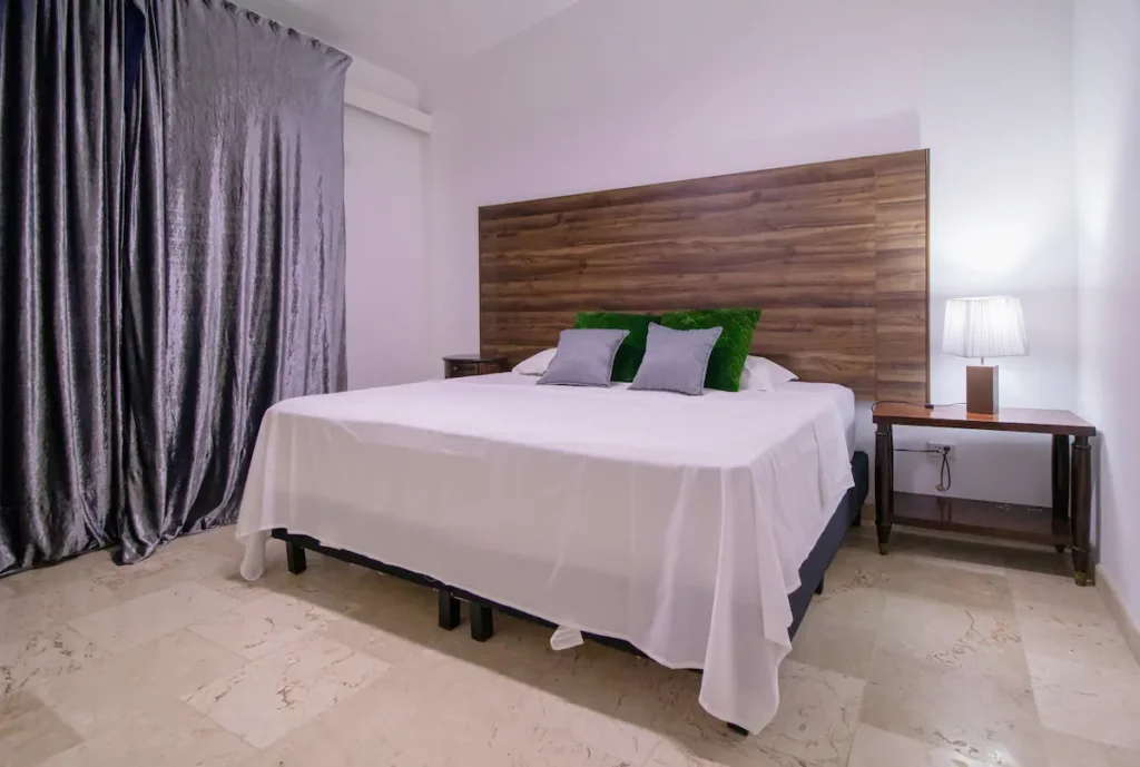 Bright double bedroom inside Villa Aurora
