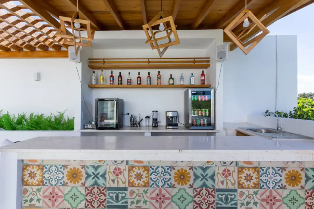 Patterned-tile pool bar at Villa Bella in Havana