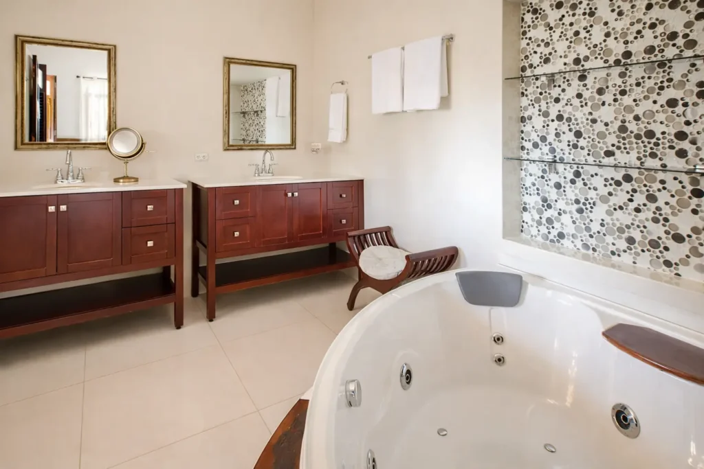 Private bathroom with jacuzzi tub at Villa Castle