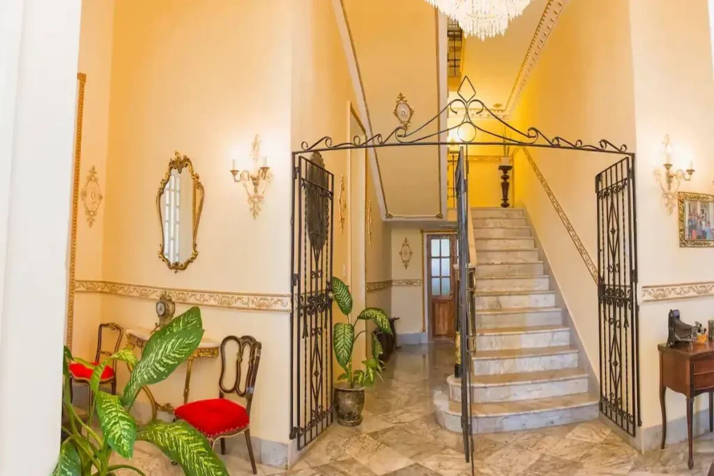 Traditional staircase and iron balustrade in Villa Condesa
