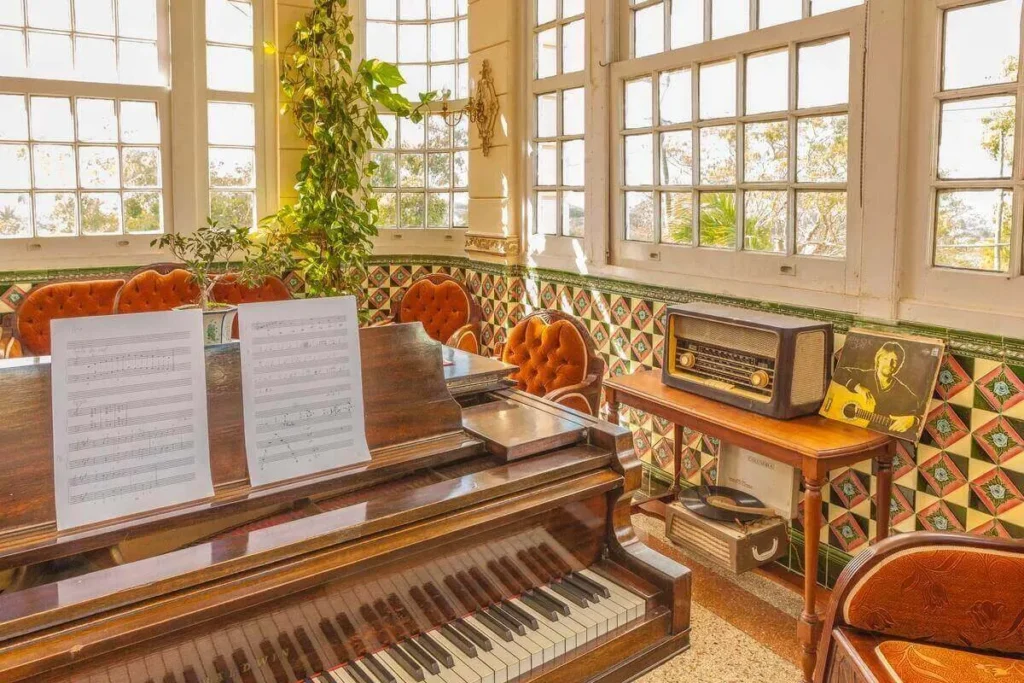 Antique piano in a bright Villa Condesa sitting room