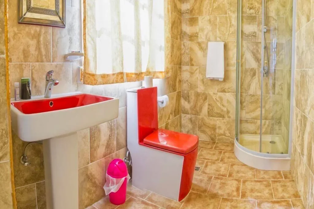 Shower enclosure and vanity in a Villa Condesa bathroom