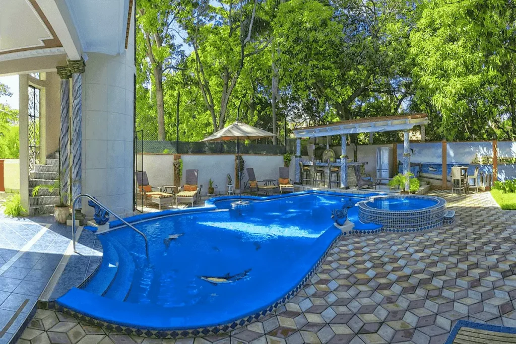 Broad view across the Villa Costa pool and jacuzzi