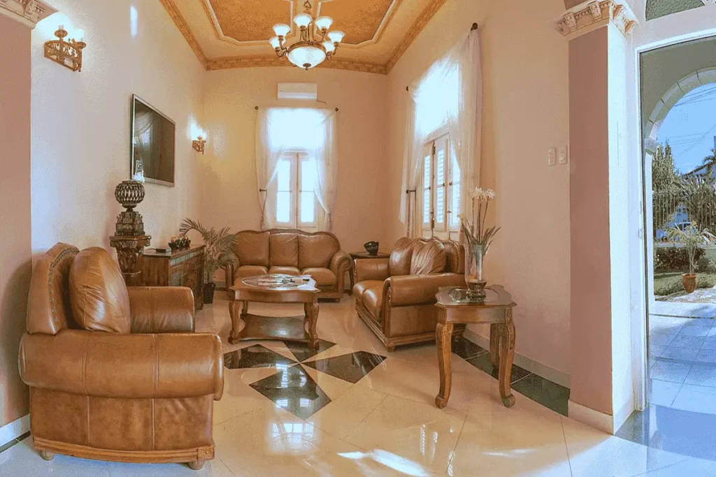 Traditional lounge with leather seating at Villa Costa