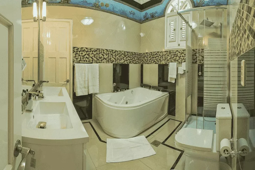 Spacious bathroom with corner tub at Villa Costa