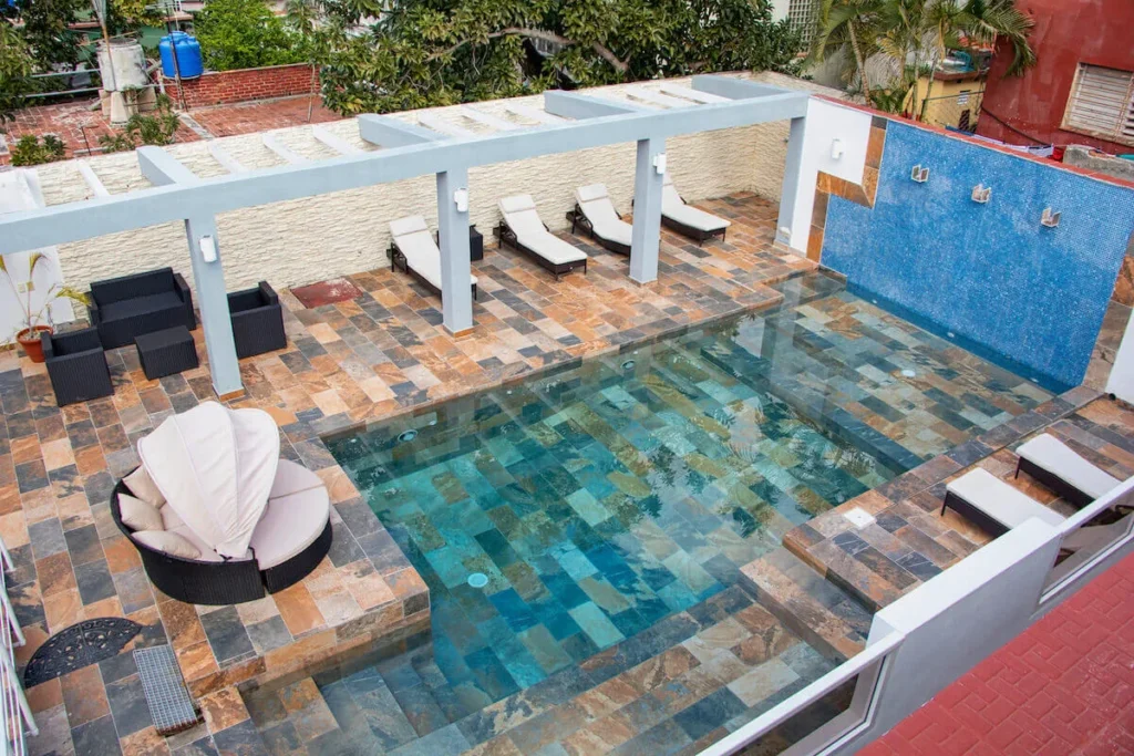 Long tiled private pool at Villa Don in Havana