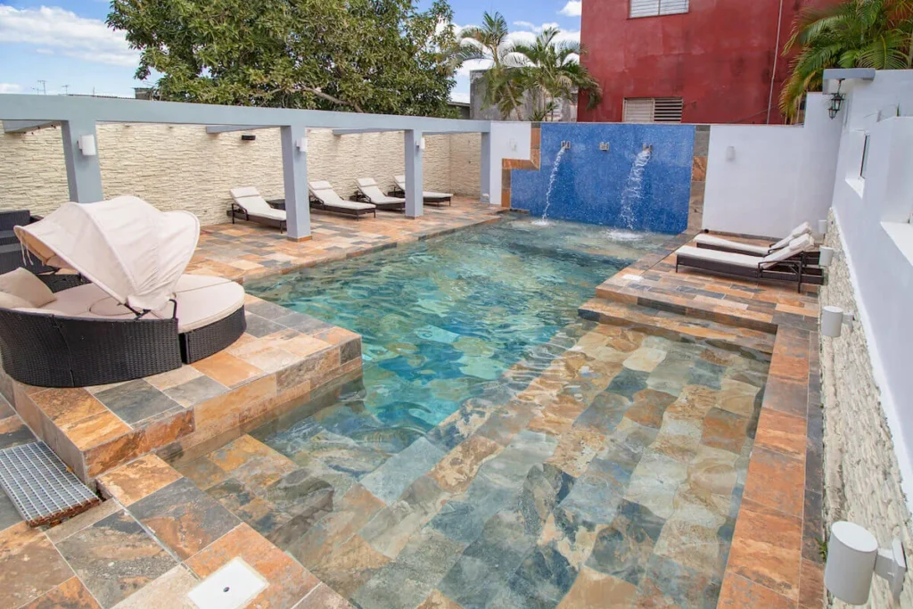 Sun loungers around the Villa Don pool
