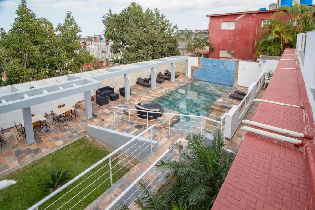 Upper terrace view across the pool at Villa Don