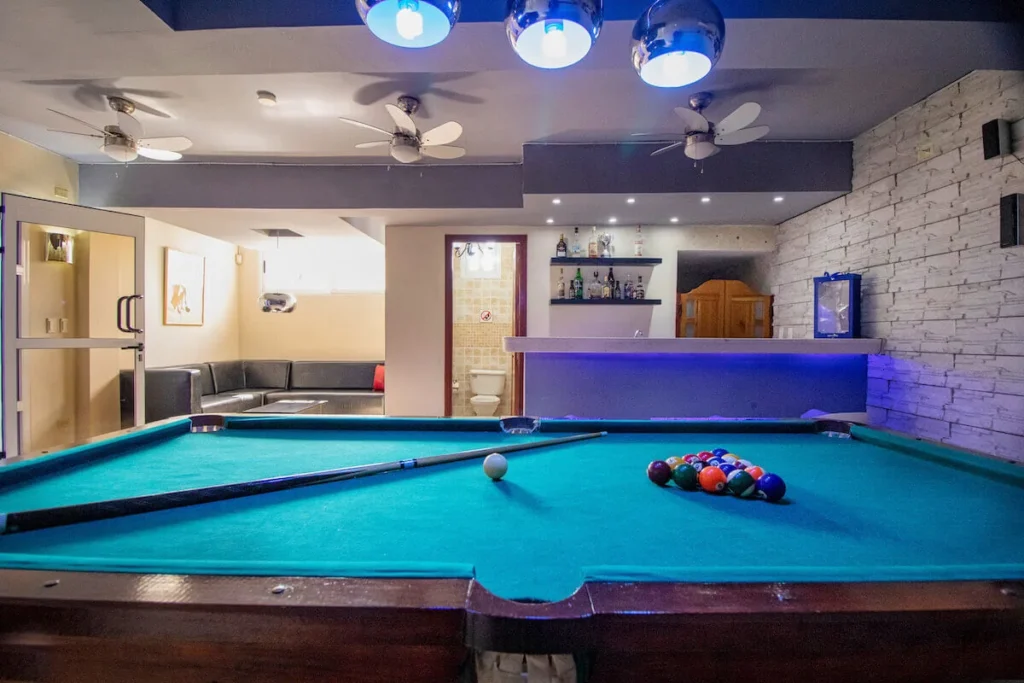 Blue billiards table in the Villa Don games room