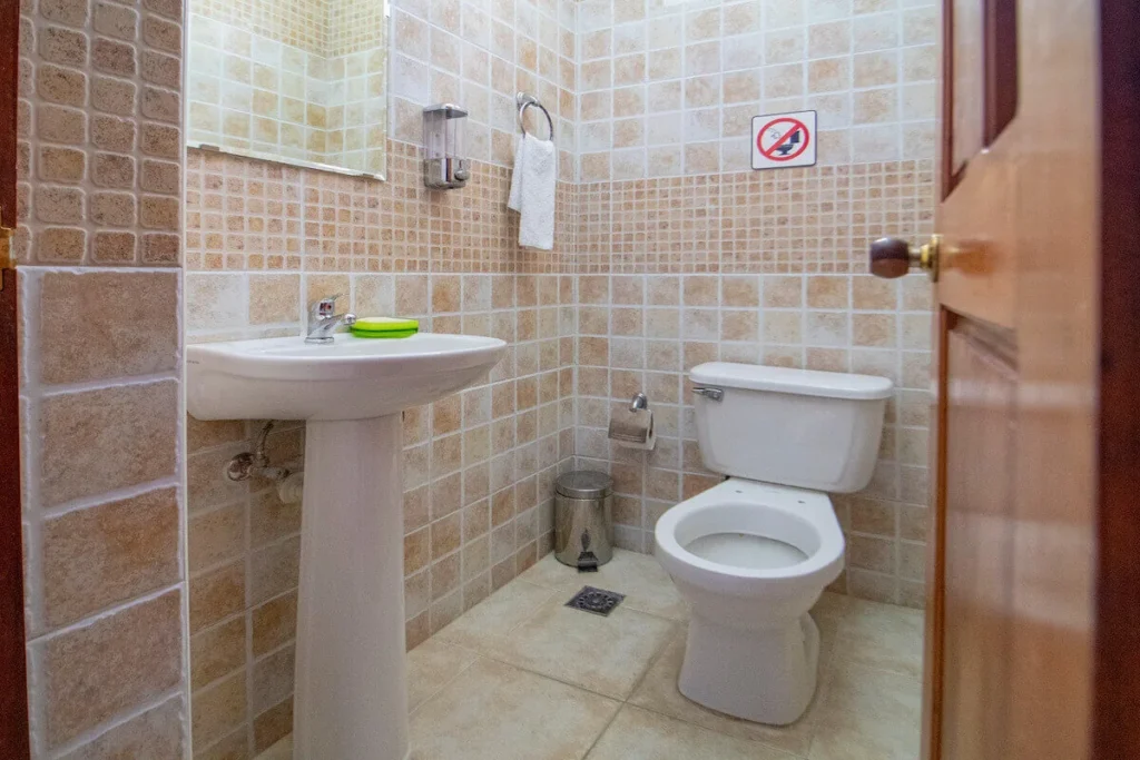 Simple tiled bathroom inside Villa Don