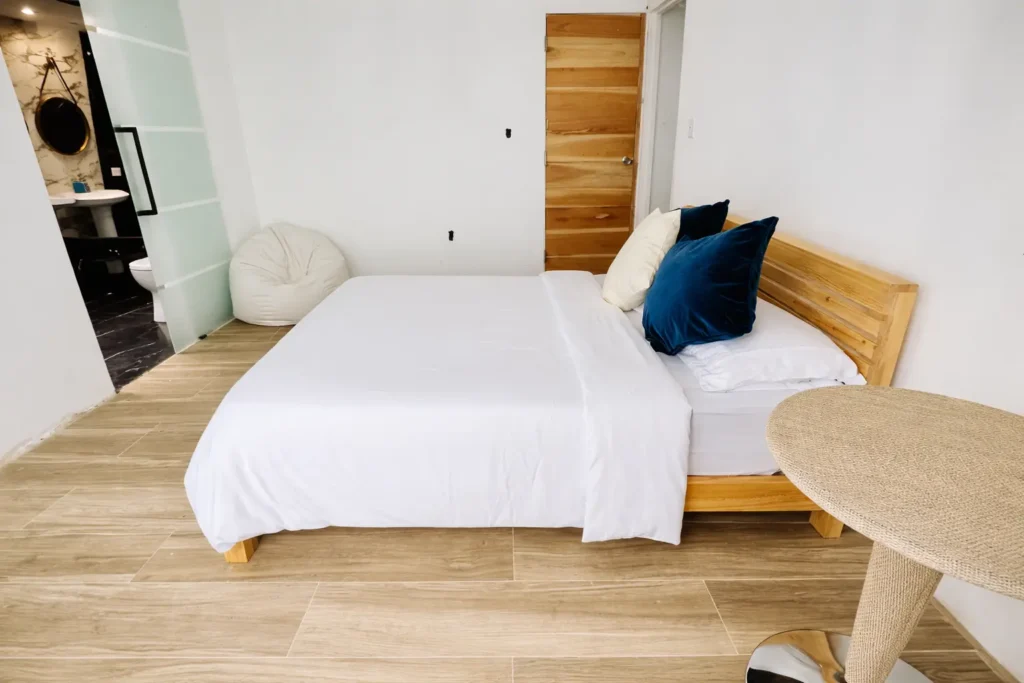 Guest bedroom with blue accents at Villa Dream
