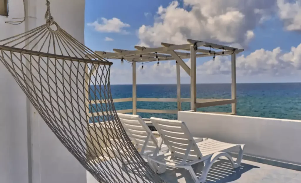 Hammock and loungers on the Villa Isis rooftop terrace