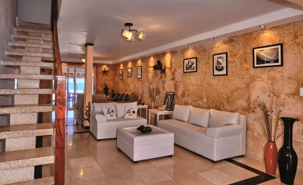 Stone-wall lounge inside Villa Isis