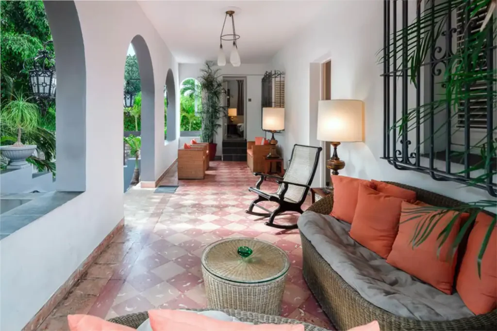 Arched veranda with colourful seating at Villa Las Cañas