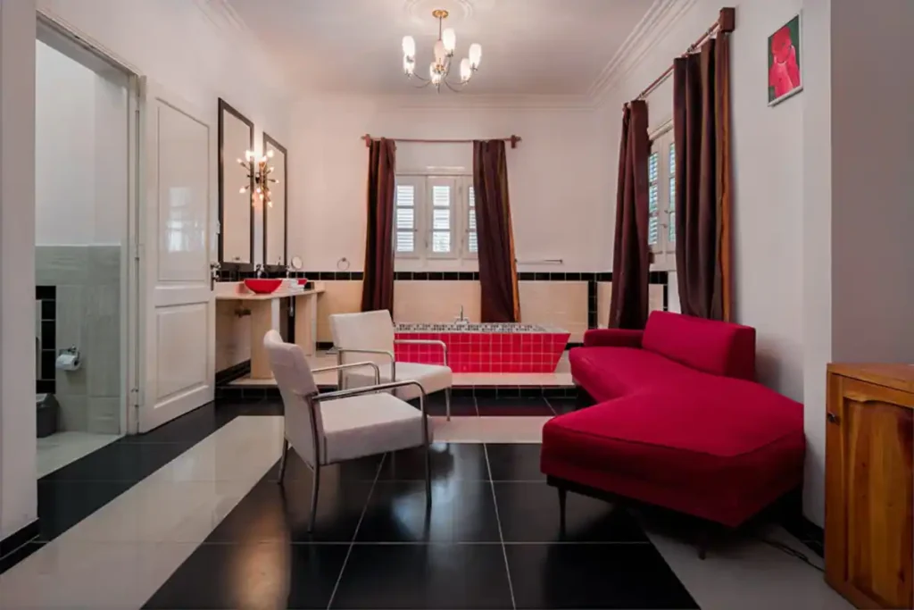 Intimate red and white lounge at Villa Las Cañas