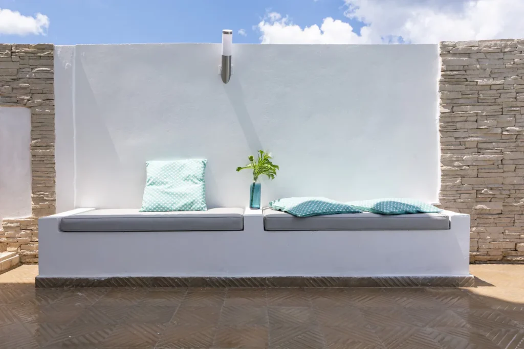 Sheltered outdoor bench on a Villa Luca terrace