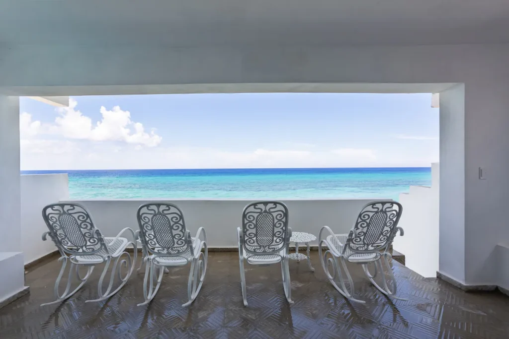 Sea-facing outdoor dining terrace at Villa Luca