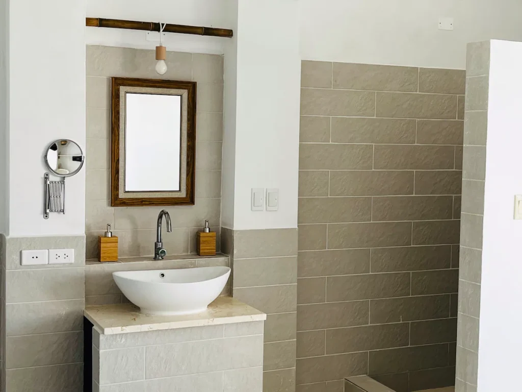 Shower room and vanity inside Villa Luca