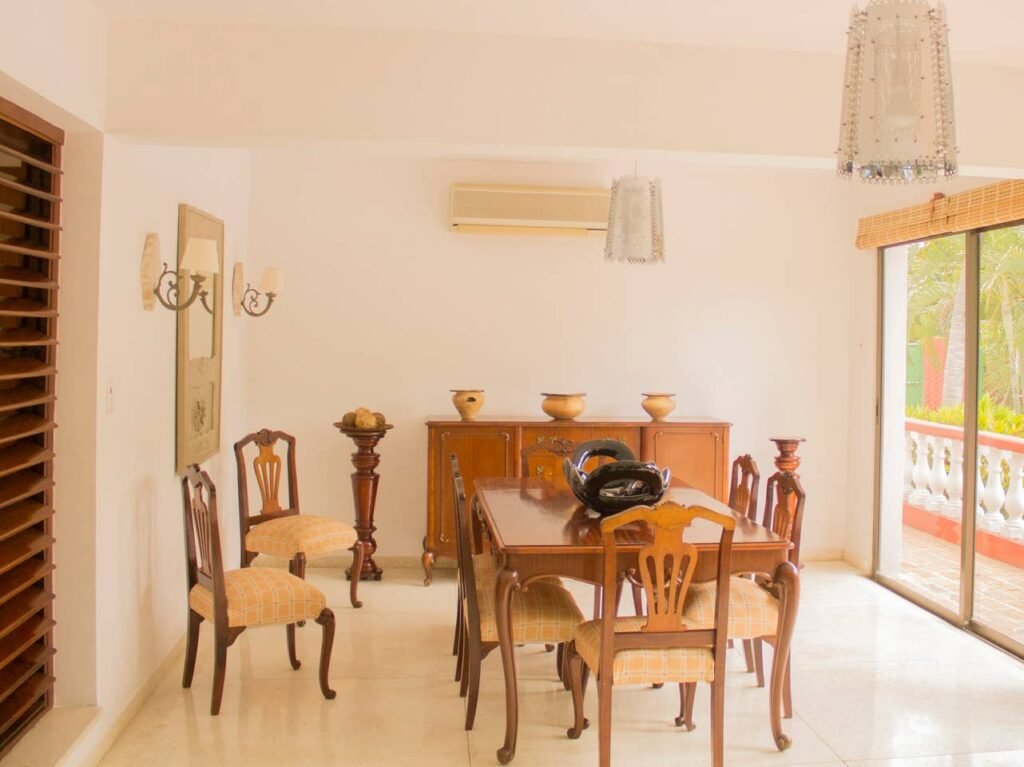 Bright dining room inside Villa Maison