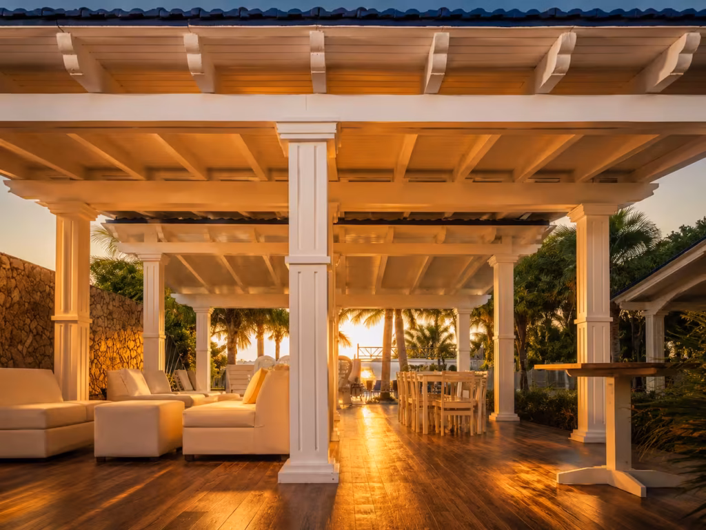 Terrace beside the pool at Villa Palm Cay