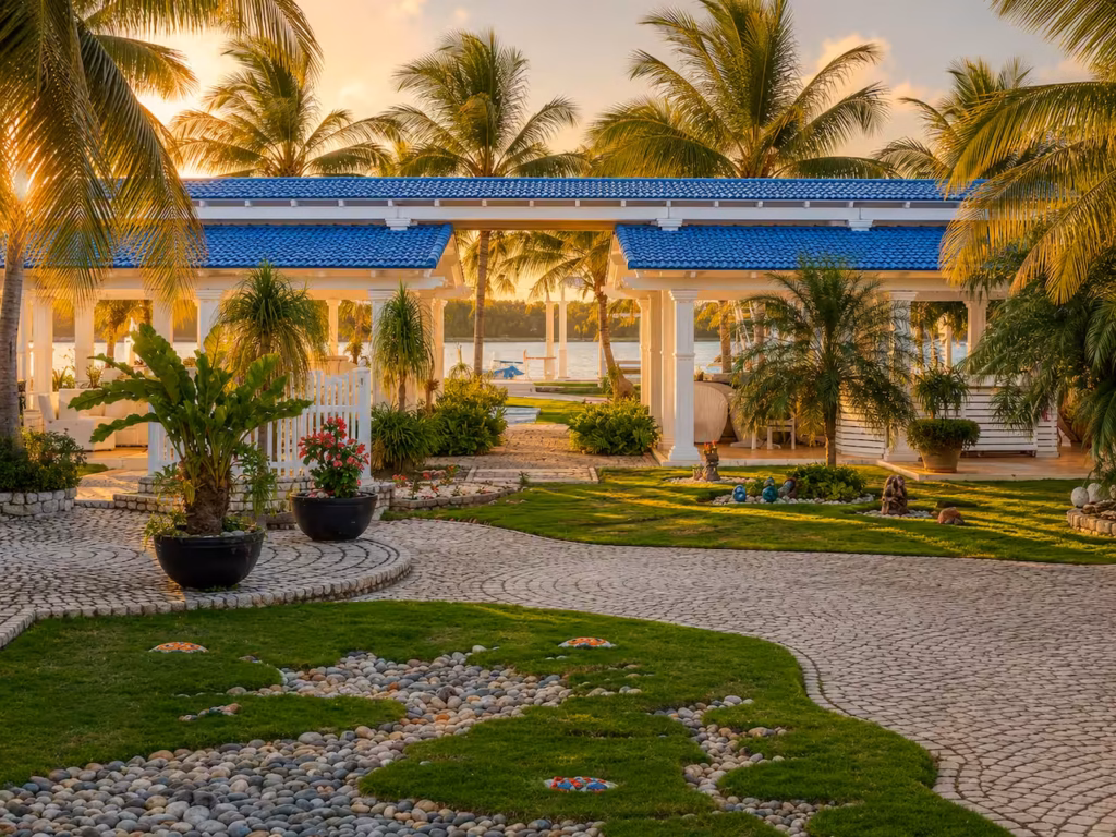 Palm garden and outdoor terrace at Villa Palm Cay