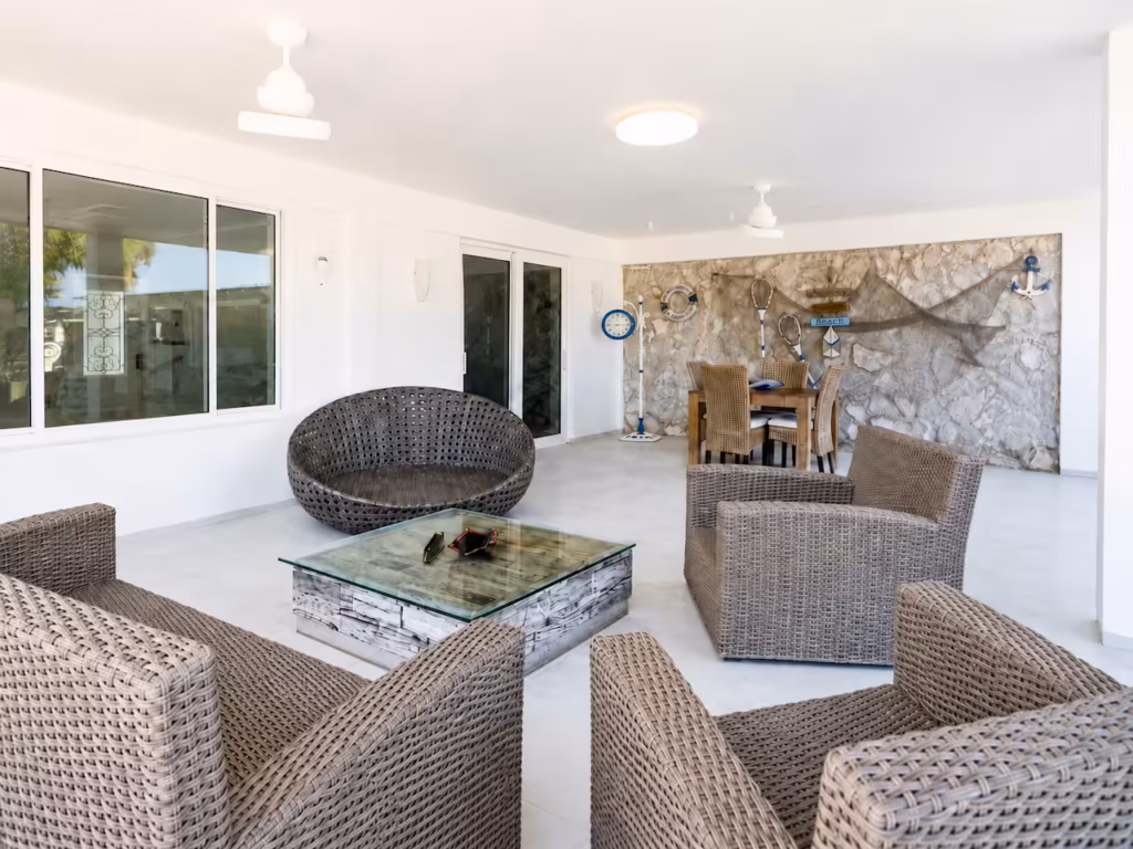 Bright shared living room at Villa Palm Cay
