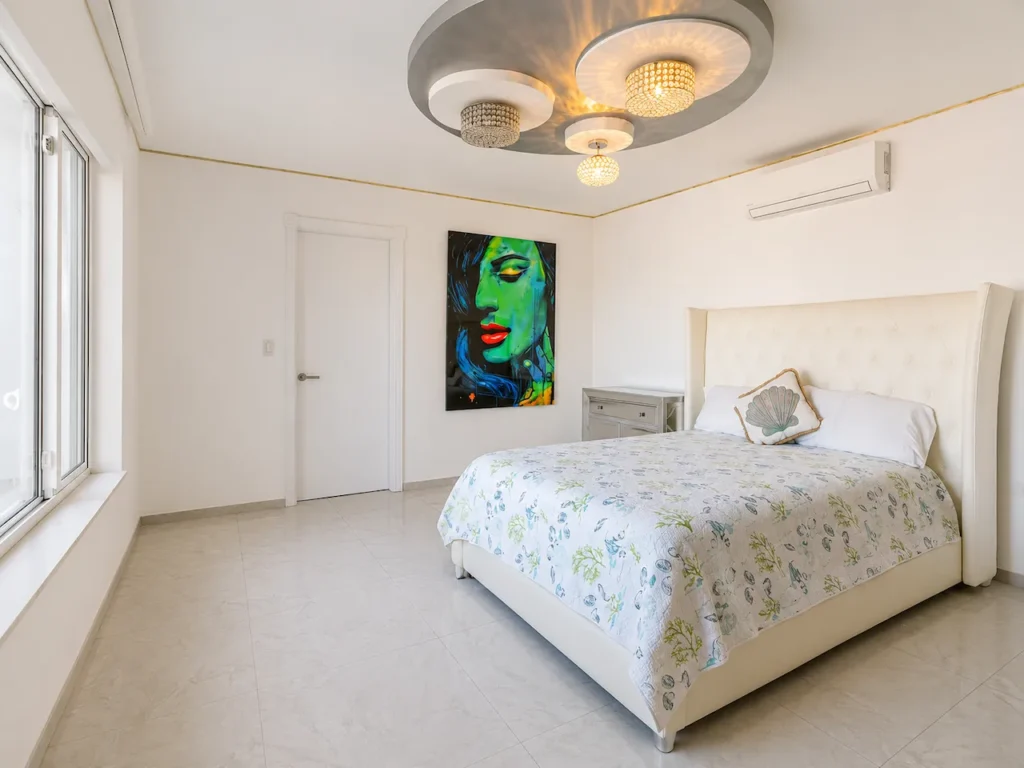 Bright bedroom interior at Villa Palm Cay